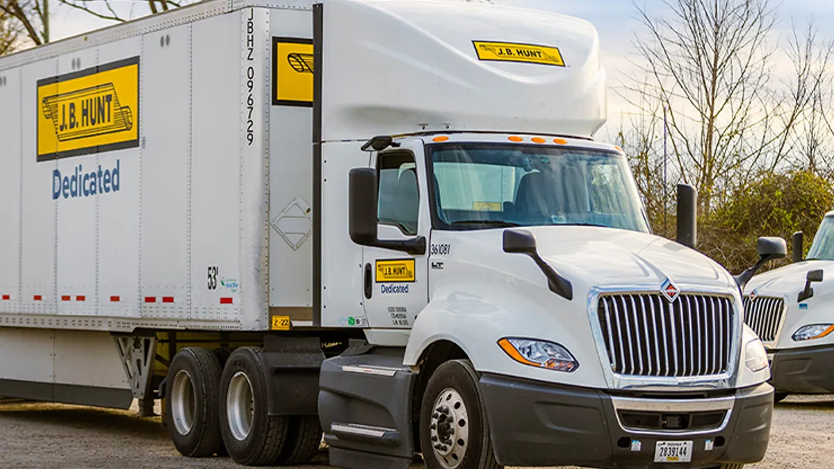 A J.B. Hunt truck parked inside a terminal.