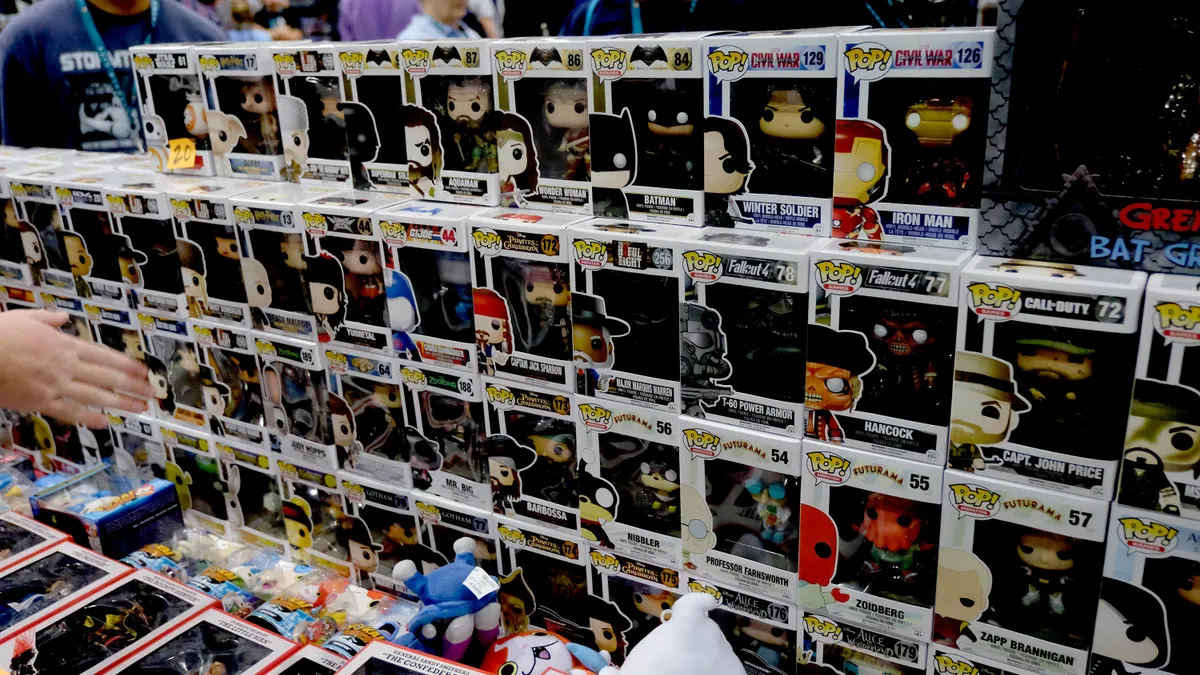 Boxed Funko Pop figurines stacked
