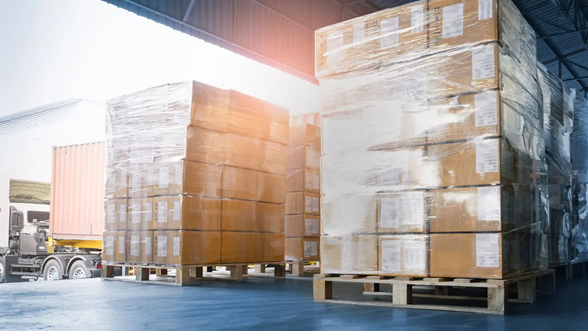 Boxes on top of pallets to be loaded on a freight truck.