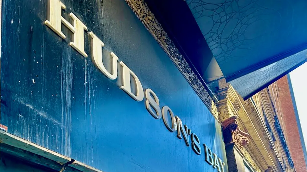 Closeup of an entrance to a department store.
